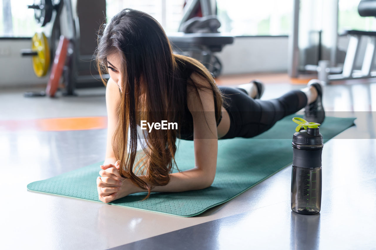 Woman exercising in gym