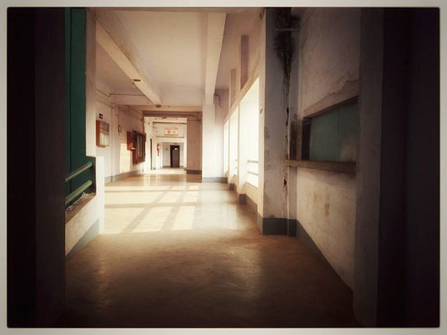 EMPTY CORRIDOR OF BUILDING