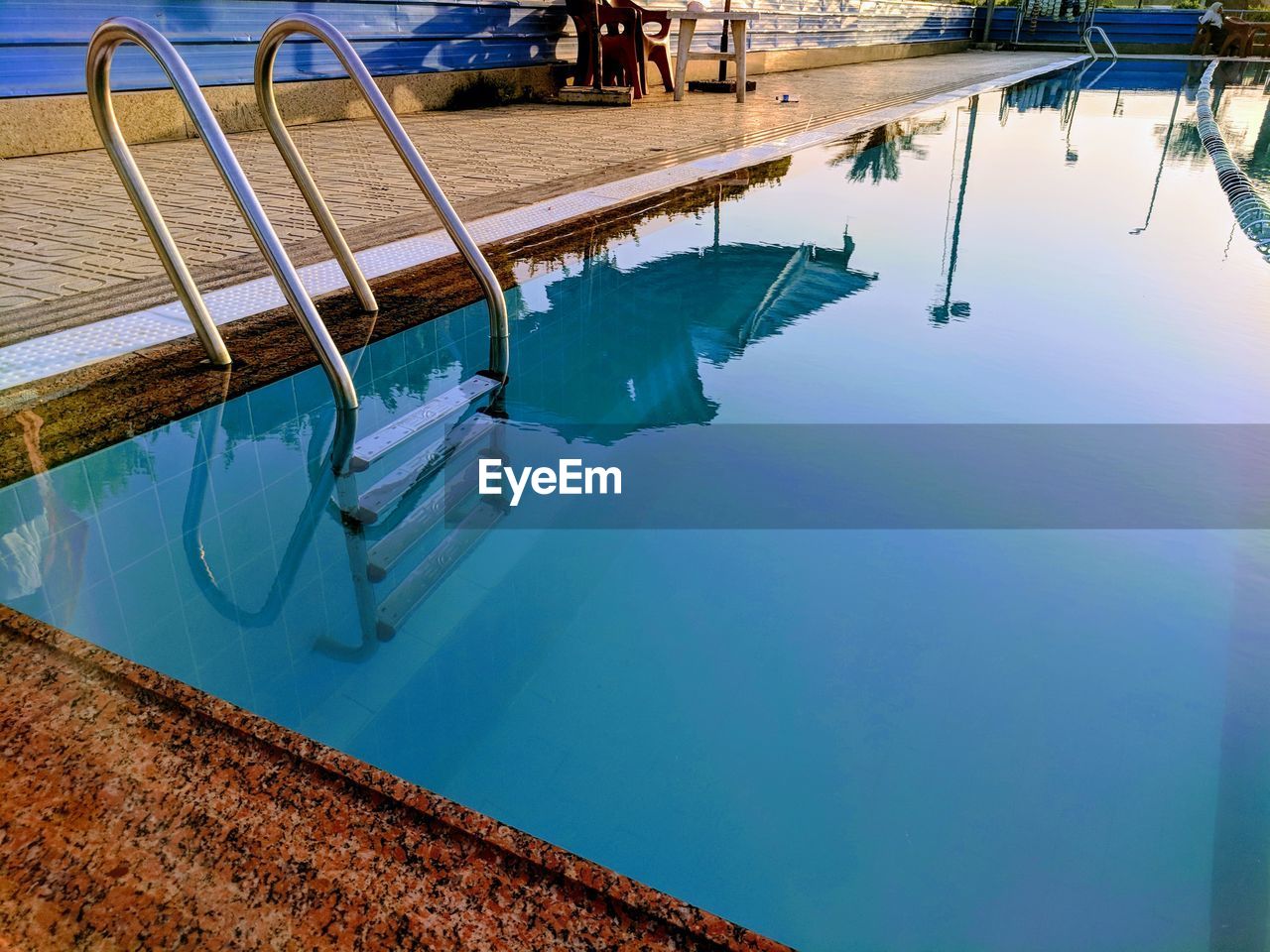 High angle view of swimming pool by lake