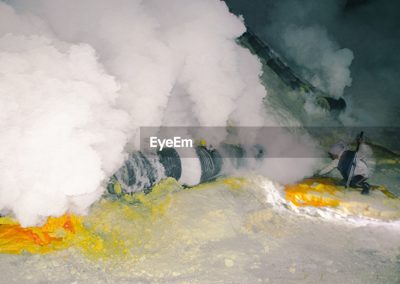 People on sulfur mine gas in kawah ijen banyuwangi