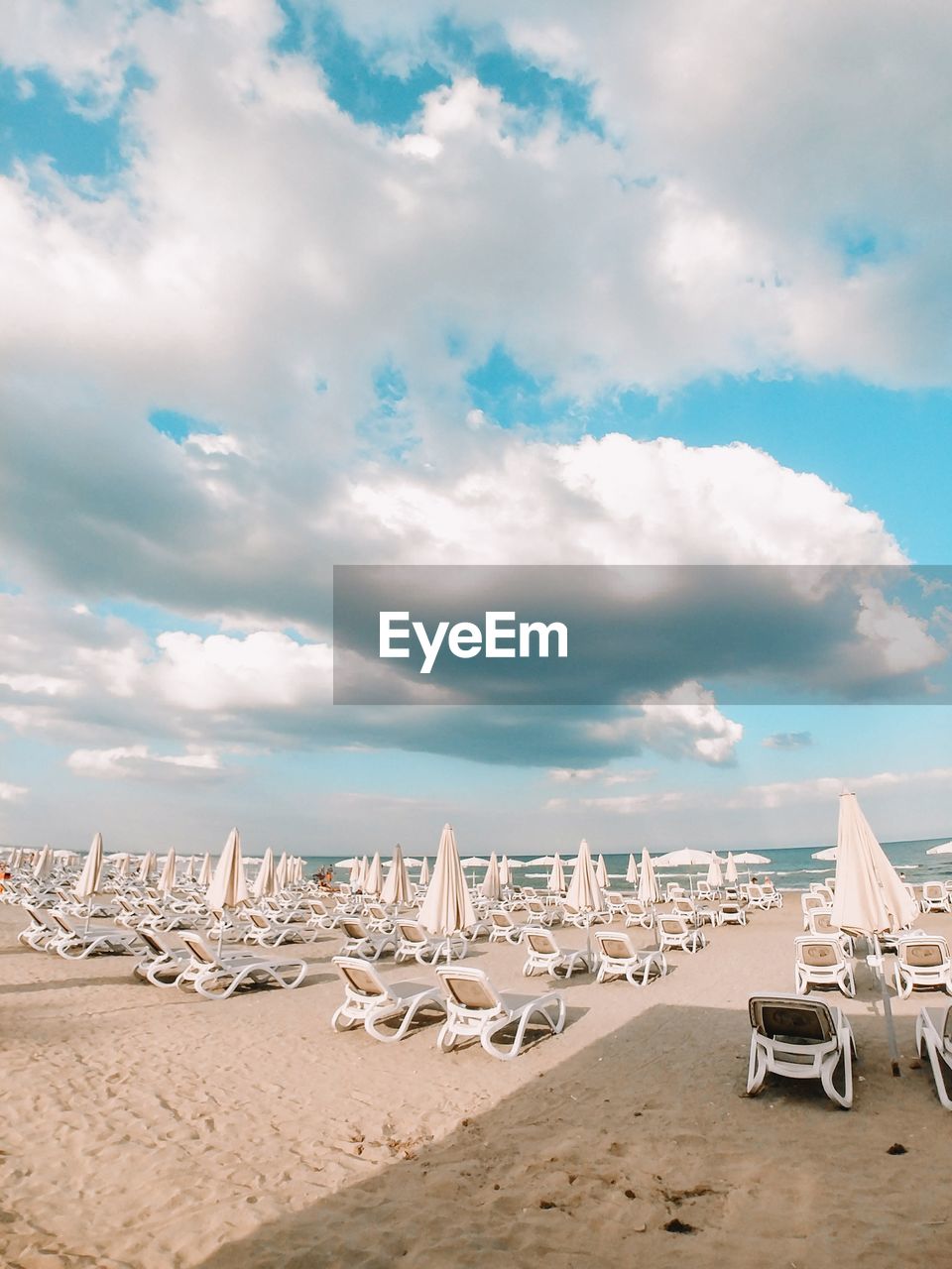 LOUNGE CHAIRS ON BEACH