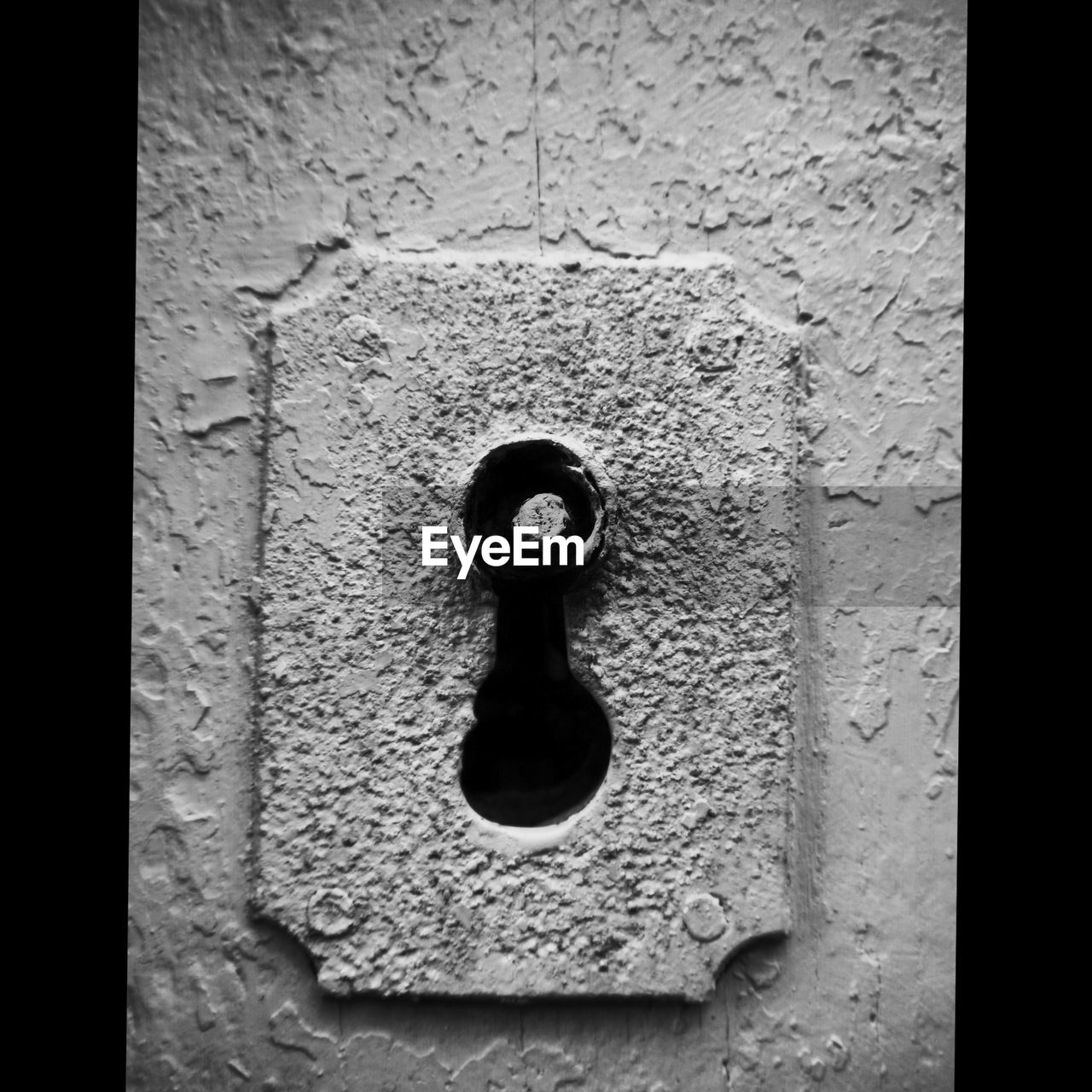 Close-up of keyhole on old door