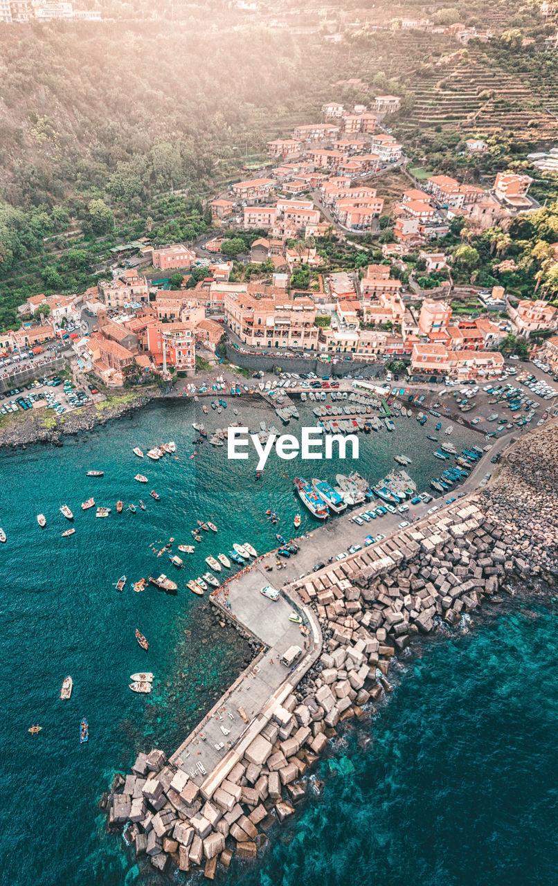 Aerial view of townscape by harbor