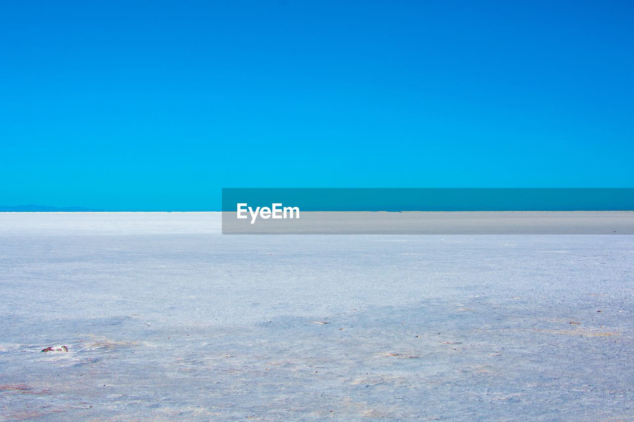 SCENIC VIEW OF LANDSCAPE AGAINST BLUE SKY