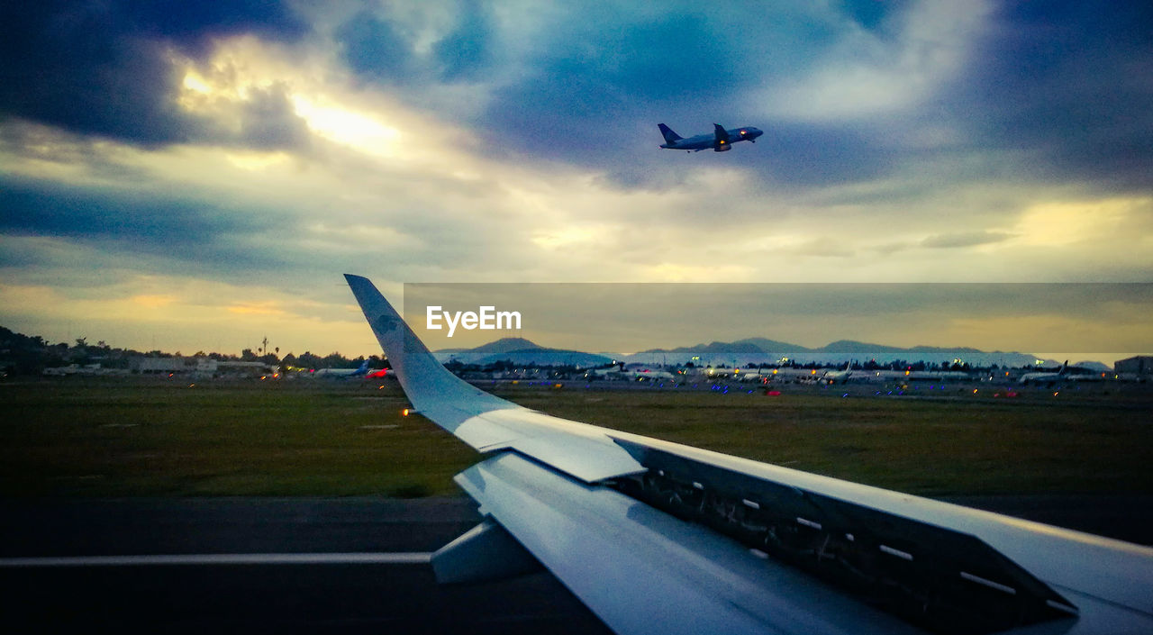 AIRPLANE FLYING IN SKY