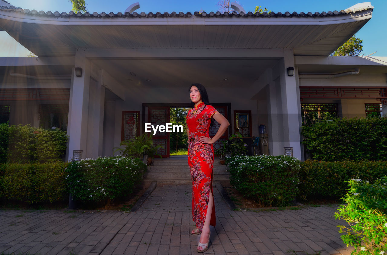 Beautiful mid adult woman wearing traditional clothing