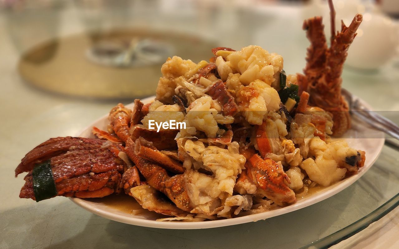 food and drink, food, dish, meal, healthy eating, meat, freshness, cuisine, produce, plate, wellbeing, no people, indoors, asian food, table, close-up, fried, kitchen utensil, focus on foreground, breakfast, eating utensil, chinese food, snack