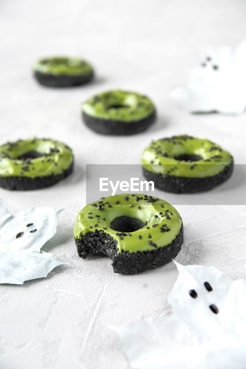 Close-up of donuts on table