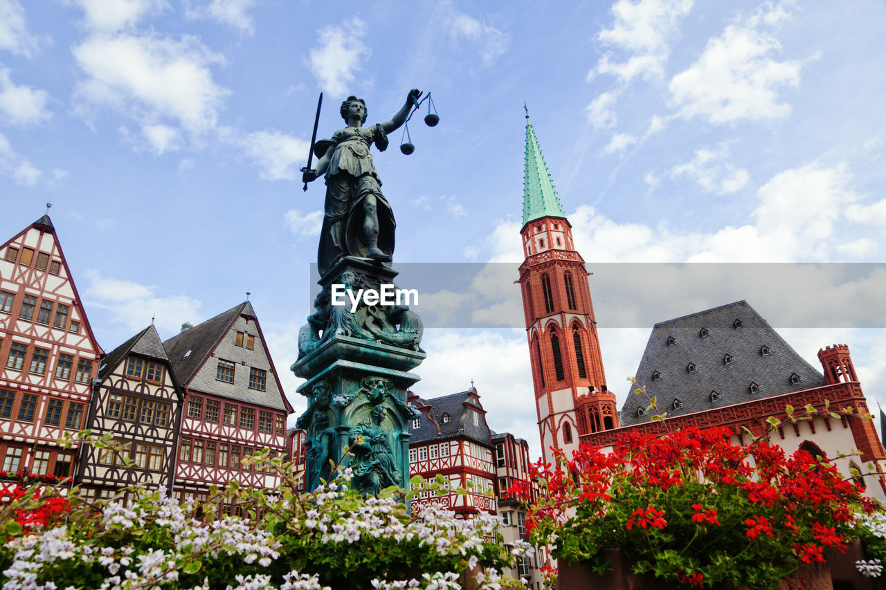 Low angle view of statue in city