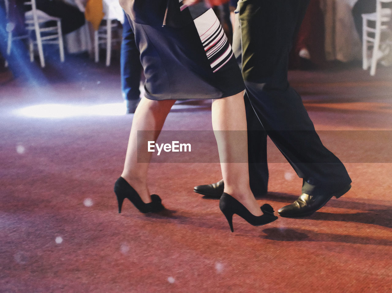 Low section of  a couple dancing tango during a wedding party