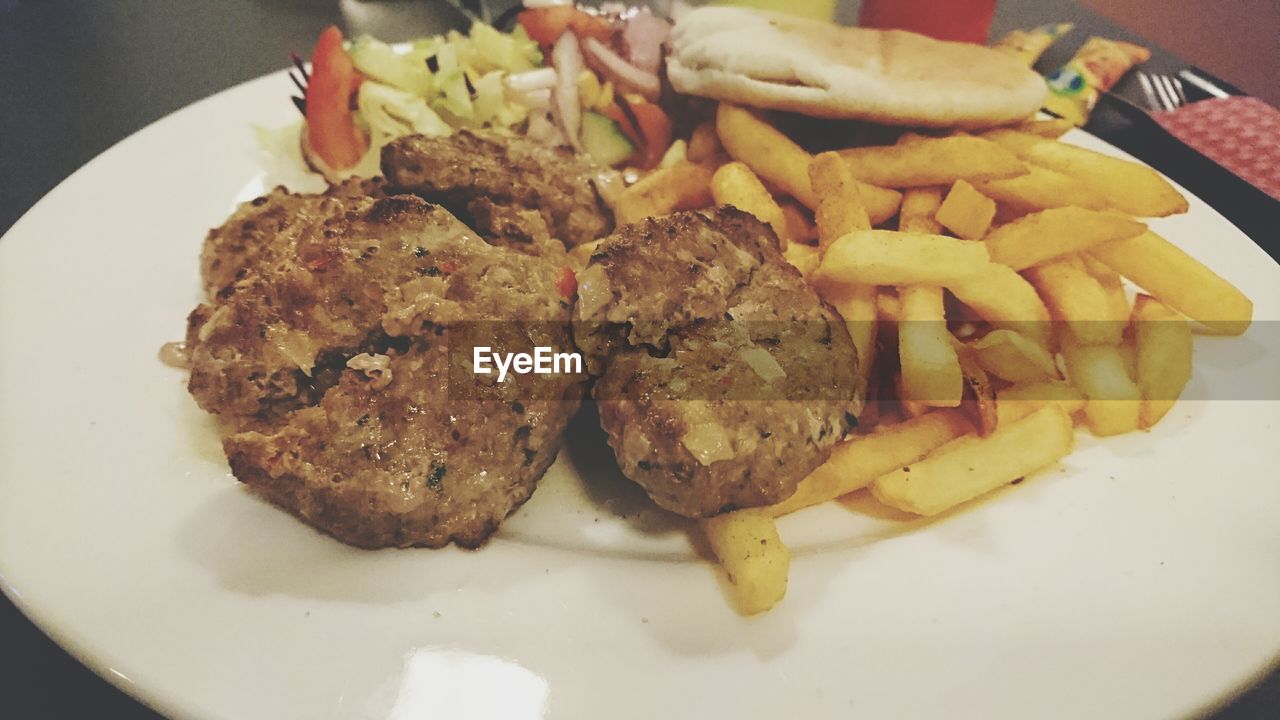 Close-up of food served on table