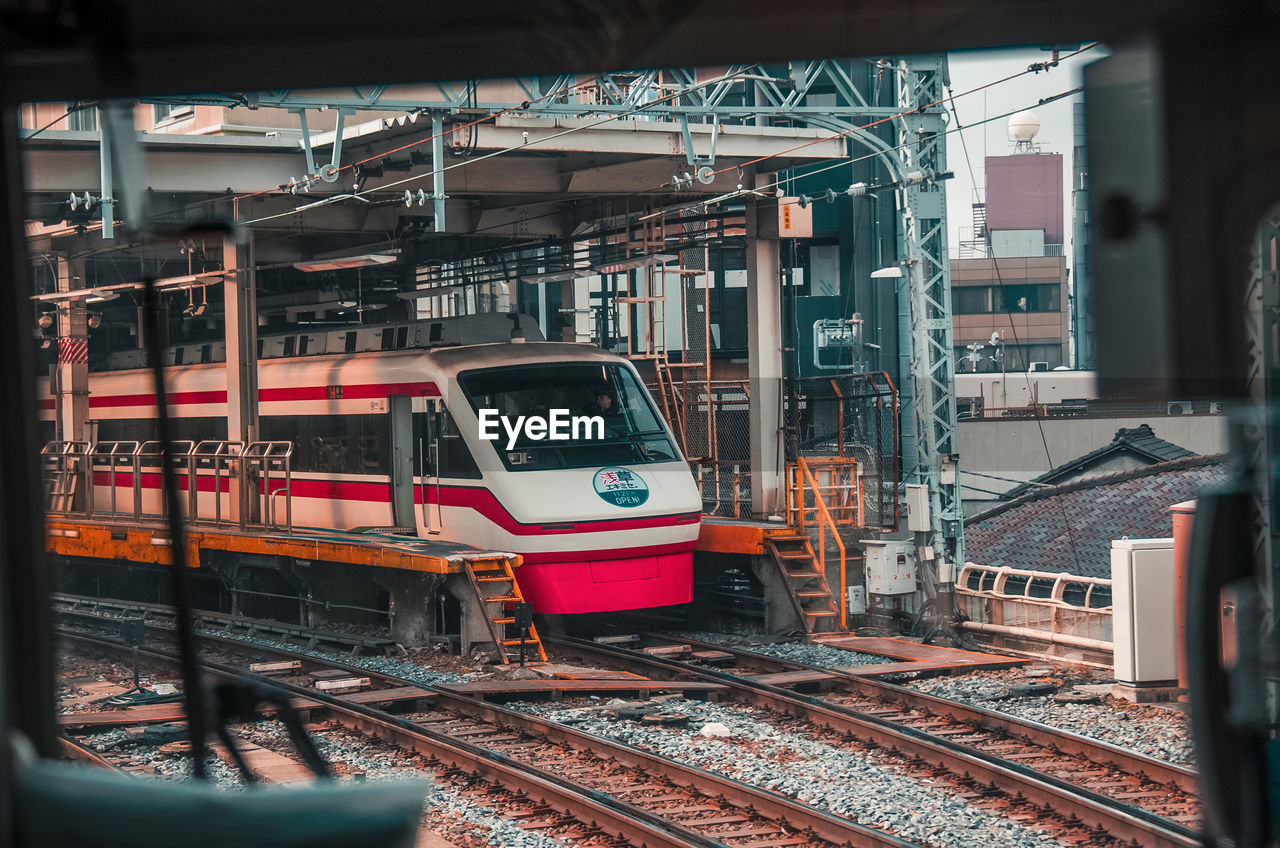 TRAIN AT RAILROAD STATION