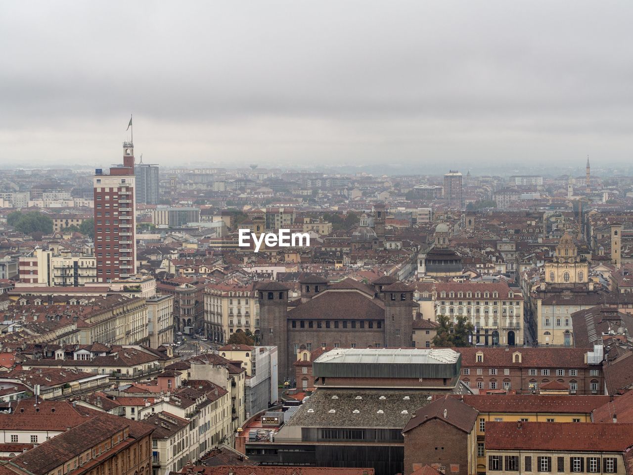 High angle view of buildings in city against sky