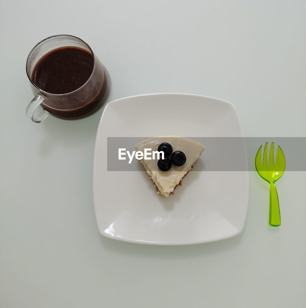 HIGH ANGLE VIEW OF DESSERT IN PLATE ON TABLE