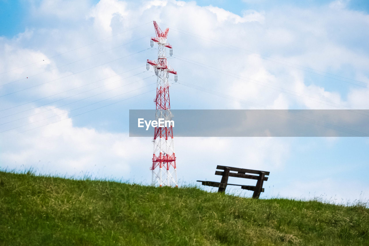 LOW ANGLE VIEW OF COMMUNICATIONS TOWER AGAINST SKY