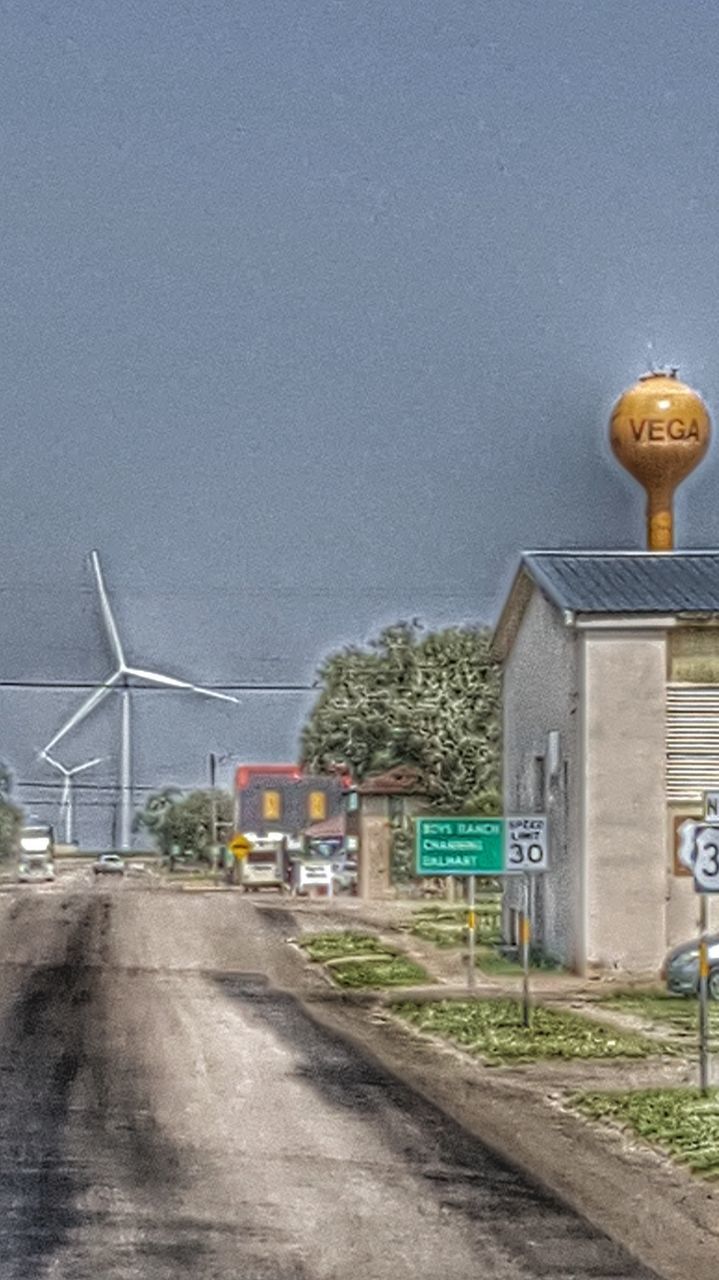 STREET LIGHT AGAINST BLUE SKY