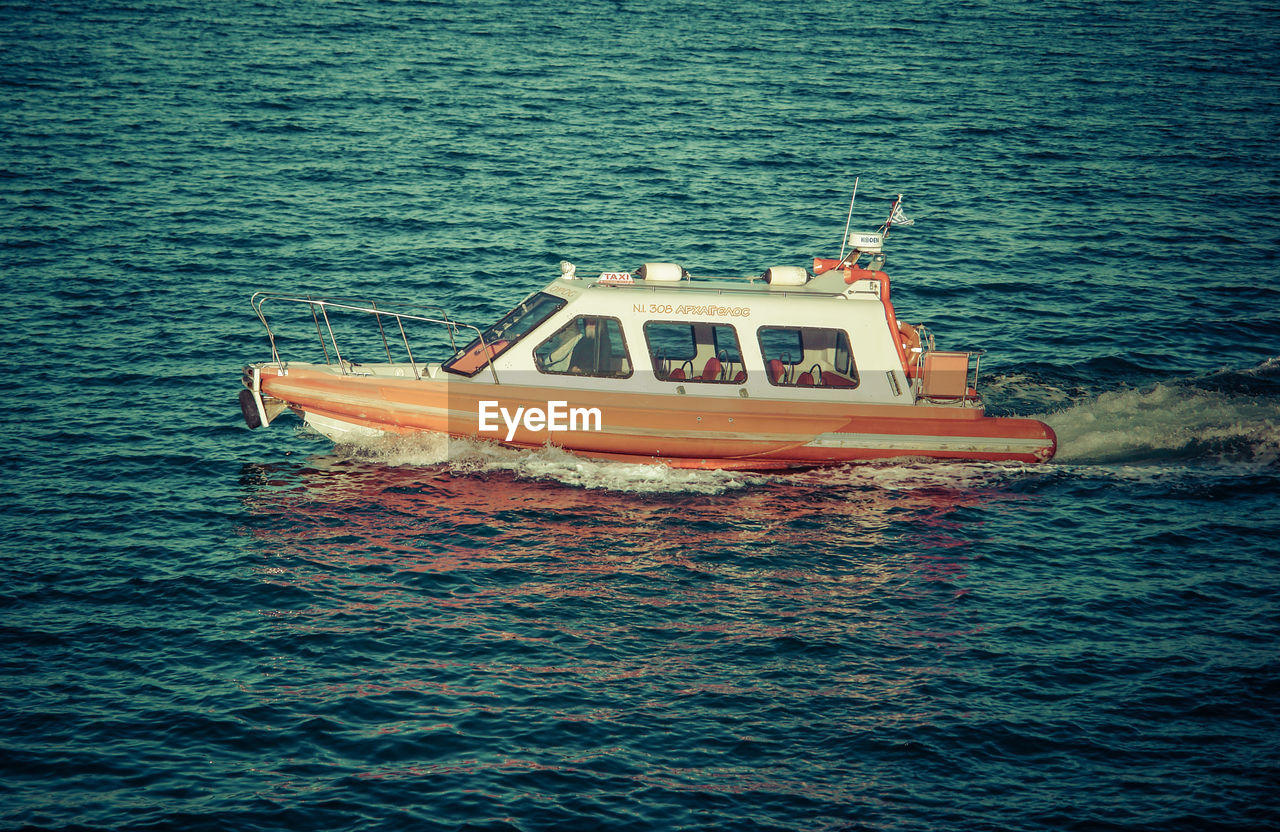 Boat sailing in sea