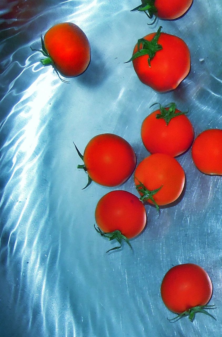 CLOSE-UP OF RED TOMATOES