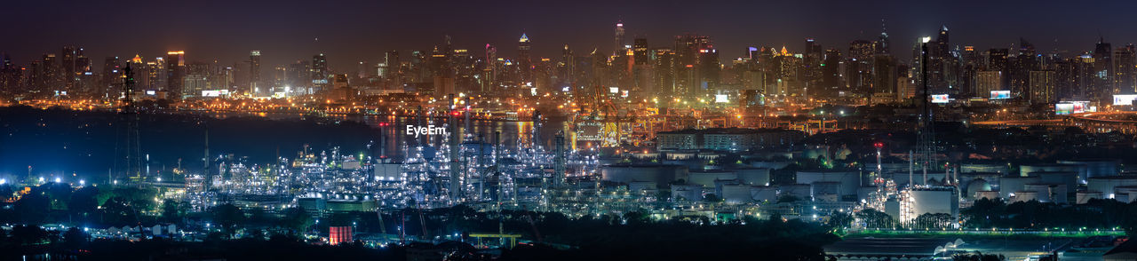 Panorama view of oil refinery and city center skyline, bangkok, thailand