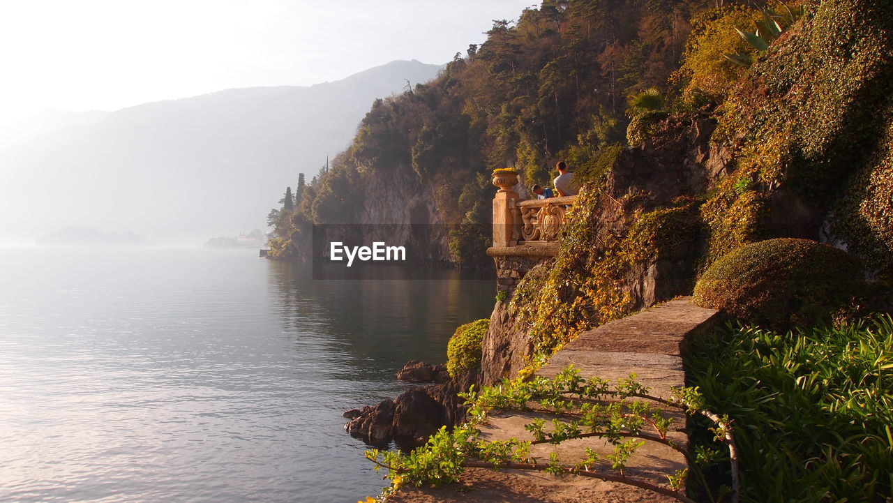 Scenic view of mountain against cloudy sky