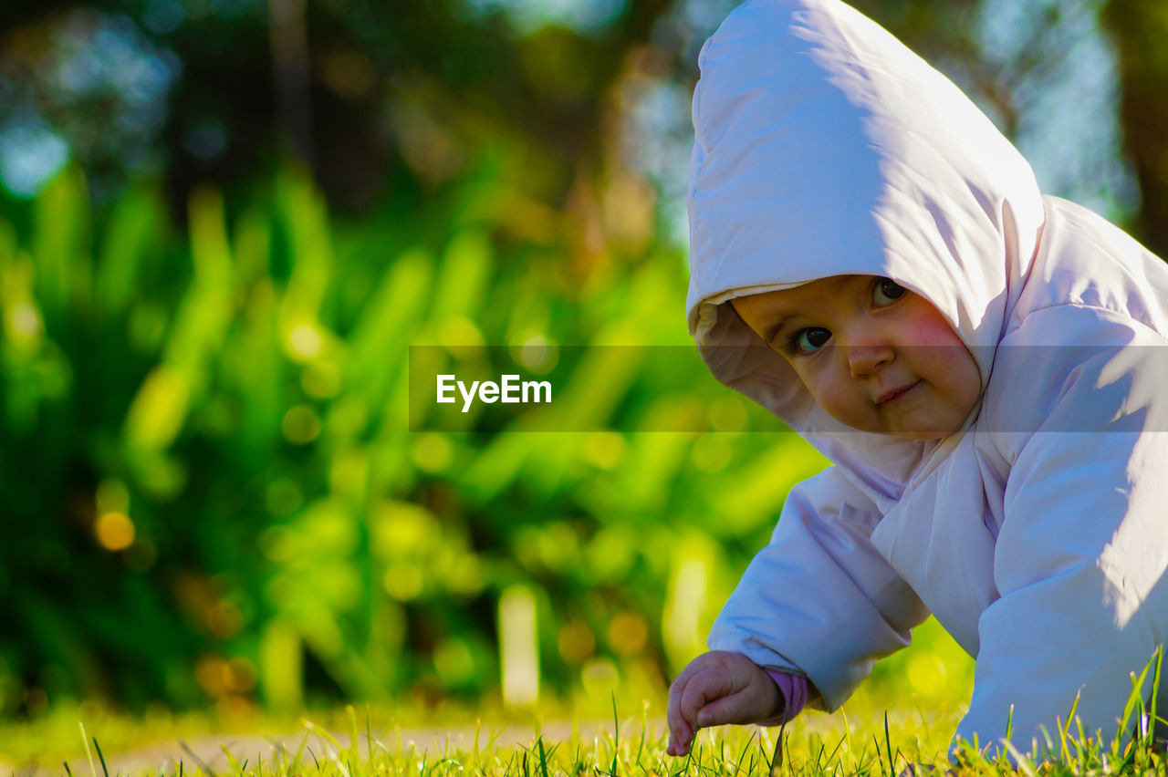 Portrait of baby on grass