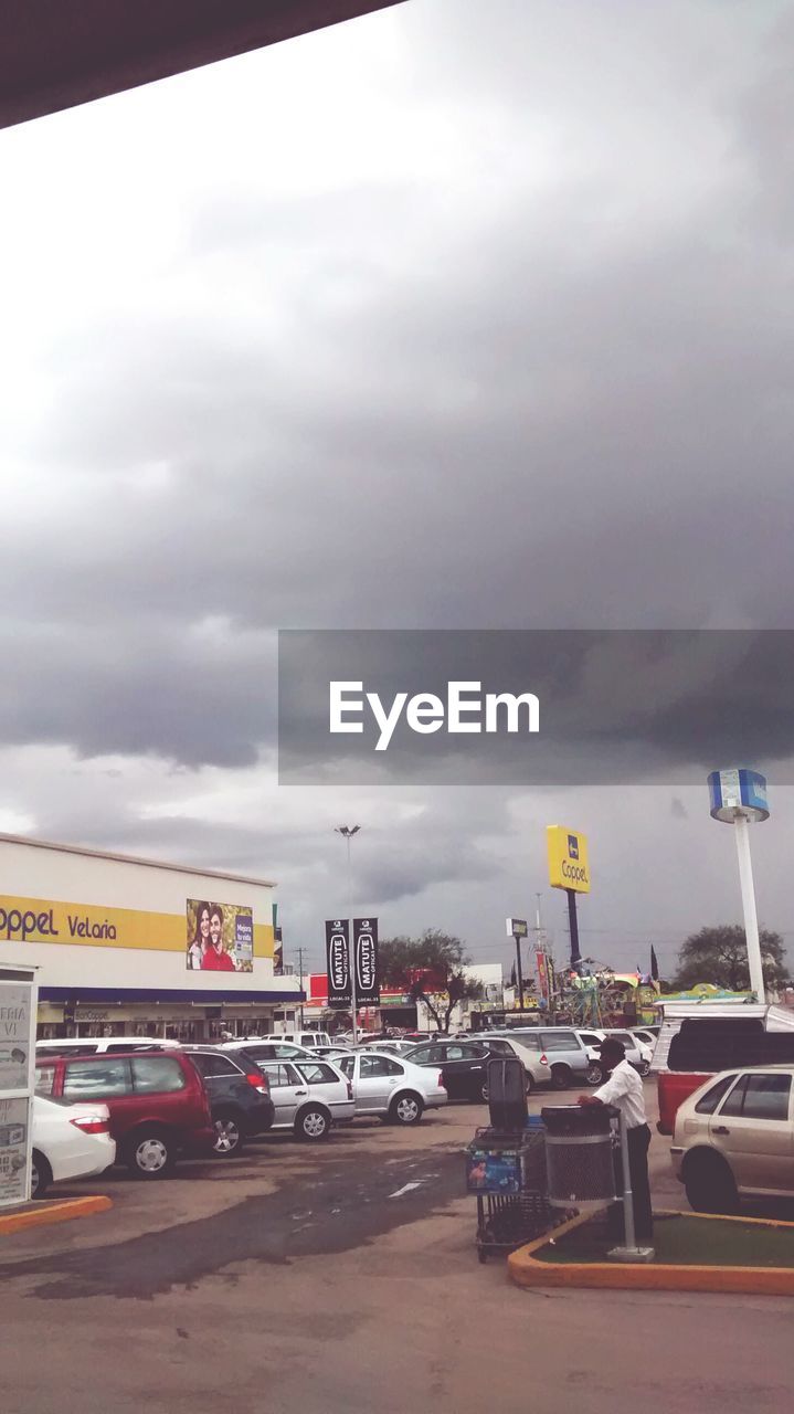 VIEW OF ROAD AGAINST CLOUDY SKY