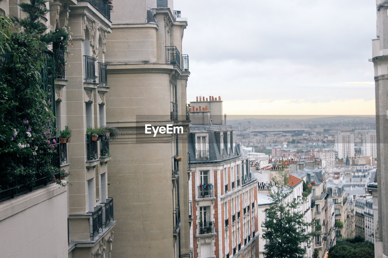 Aerial view of city against sky