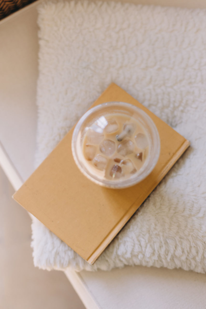 high angle view of coffee on bed at home