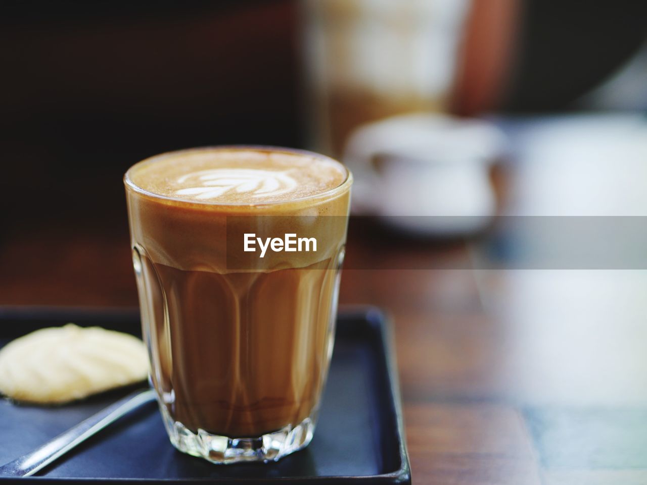 Close-up of latte on table