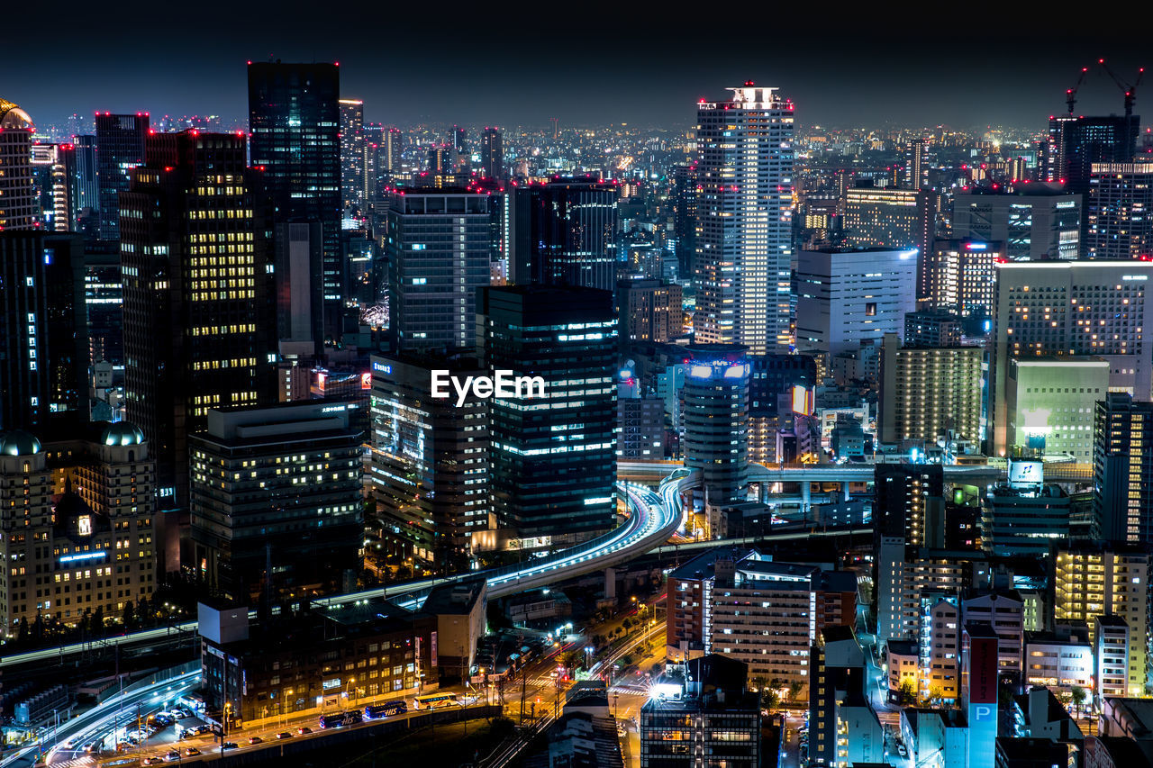 Illuminated cityscape at night