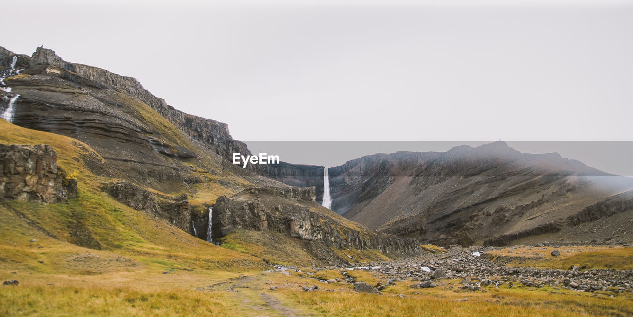 Scenic view of mountains against clear sky