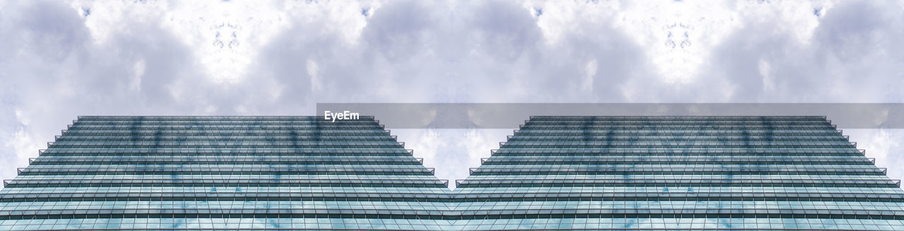 Low angle view of modern building against sky