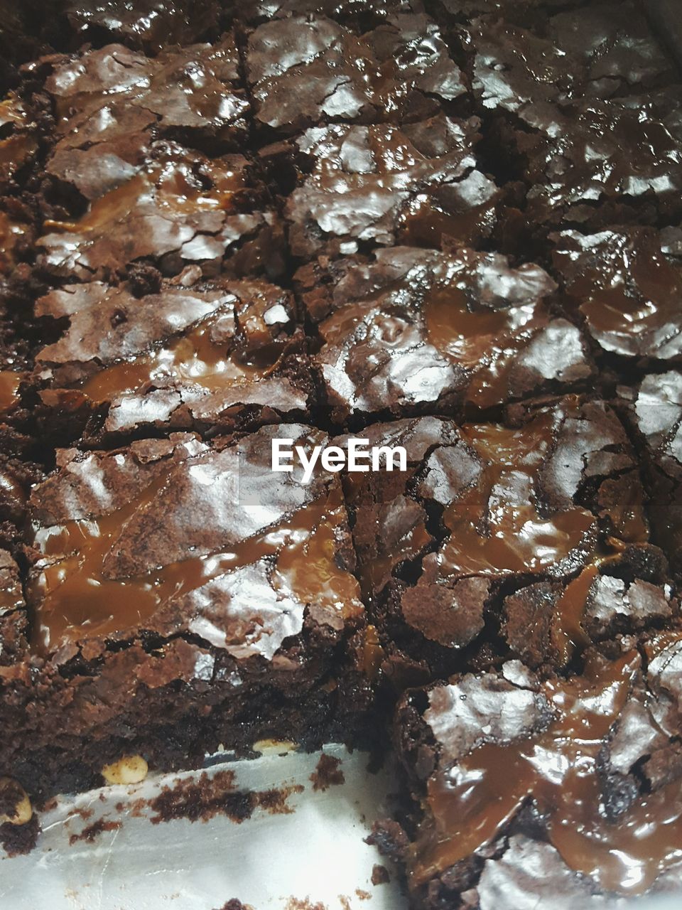 Close-up of caramel walnut brownies