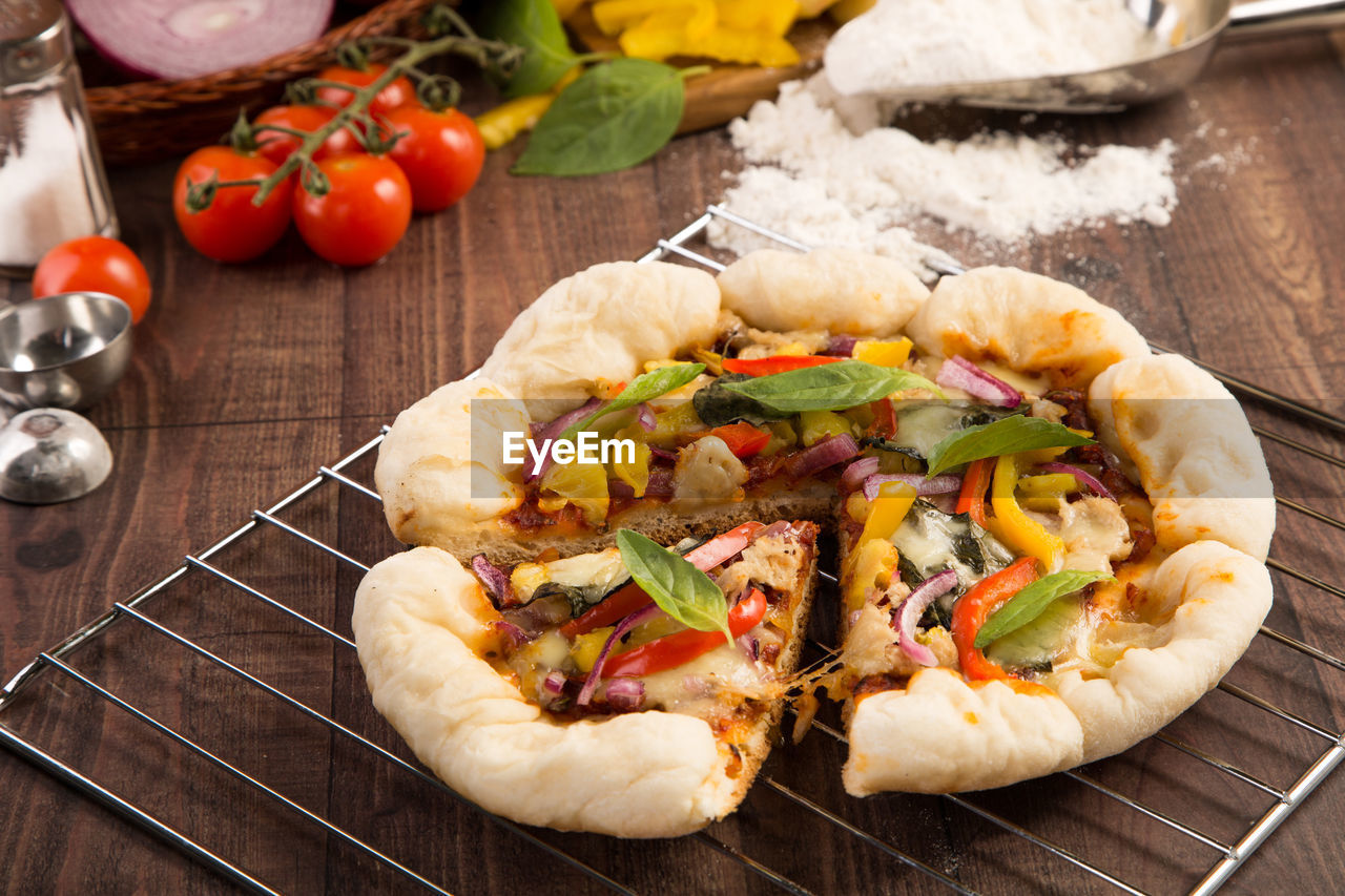 High angle view of pizza on cooling rack