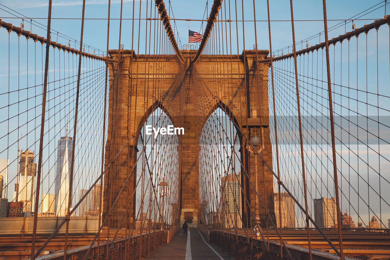 Brooklyn bridge against sky in city