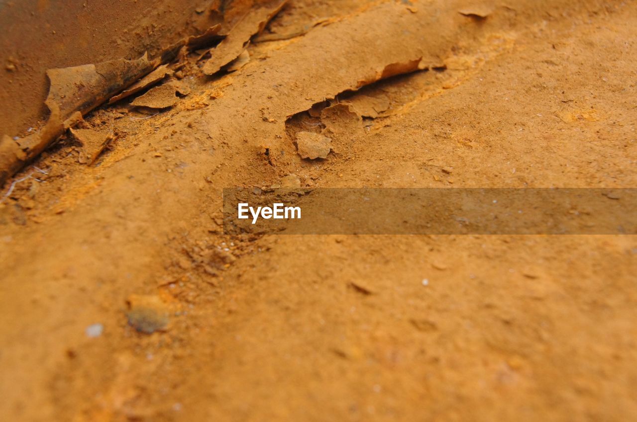 HIGH ANGLE VIEW OF SAND