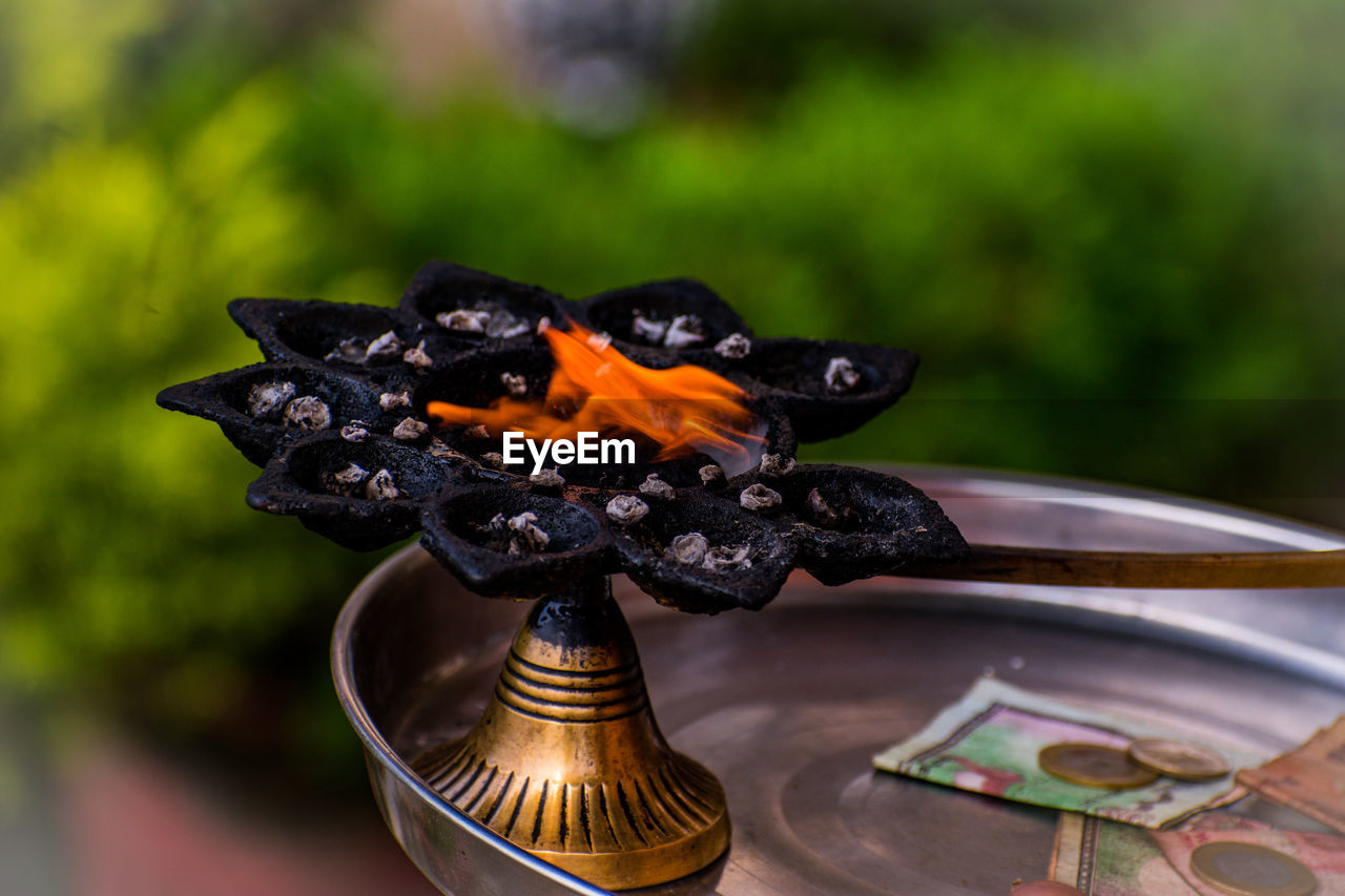 Close-up of diya 