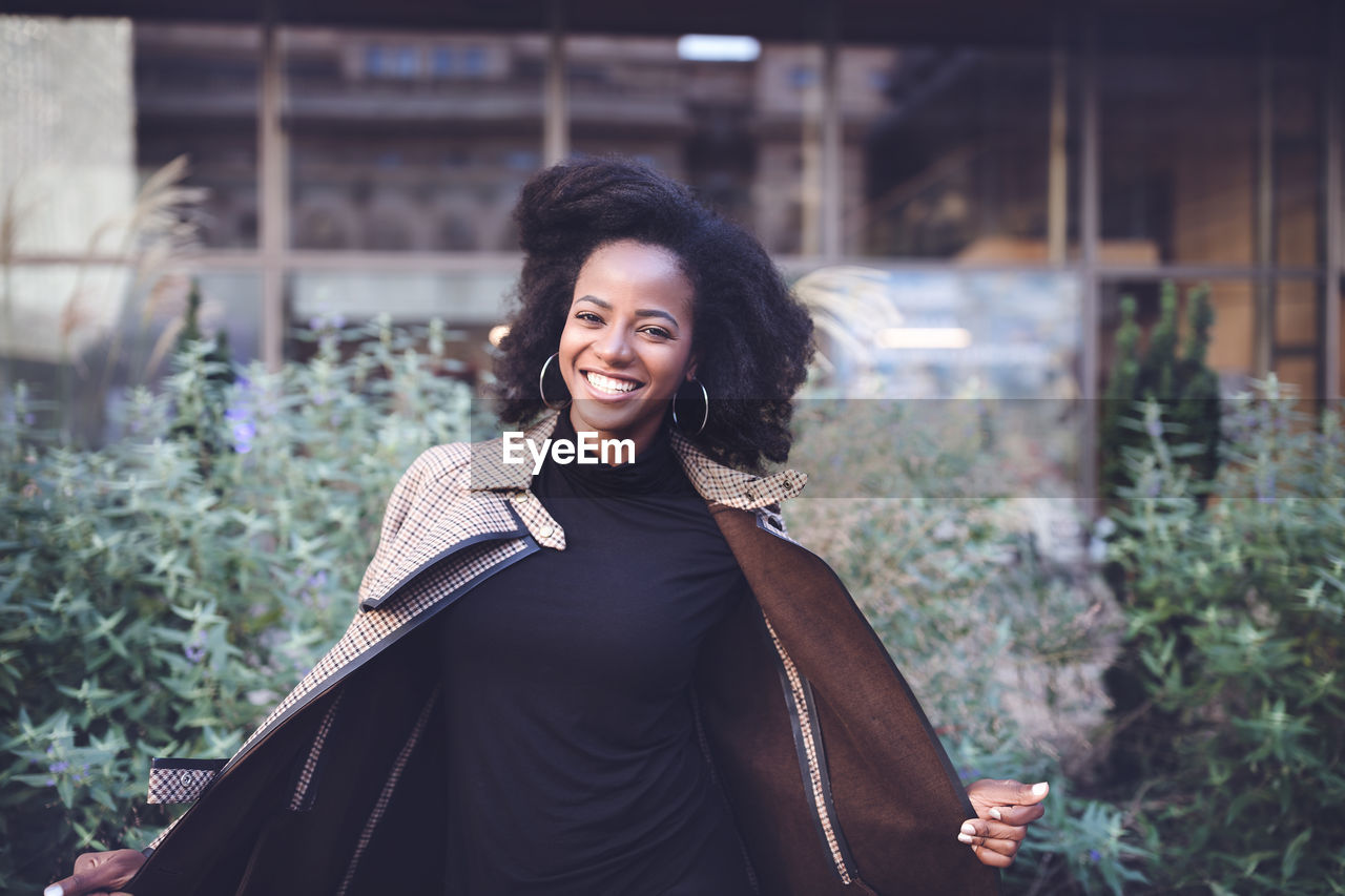 Beautiful african american woman in a spring park