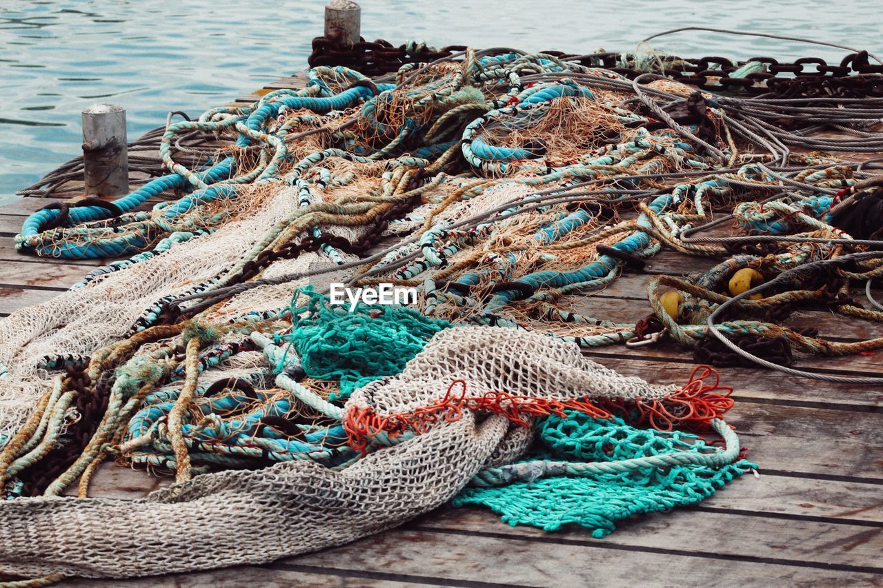 High angle view of fishing net at harbor