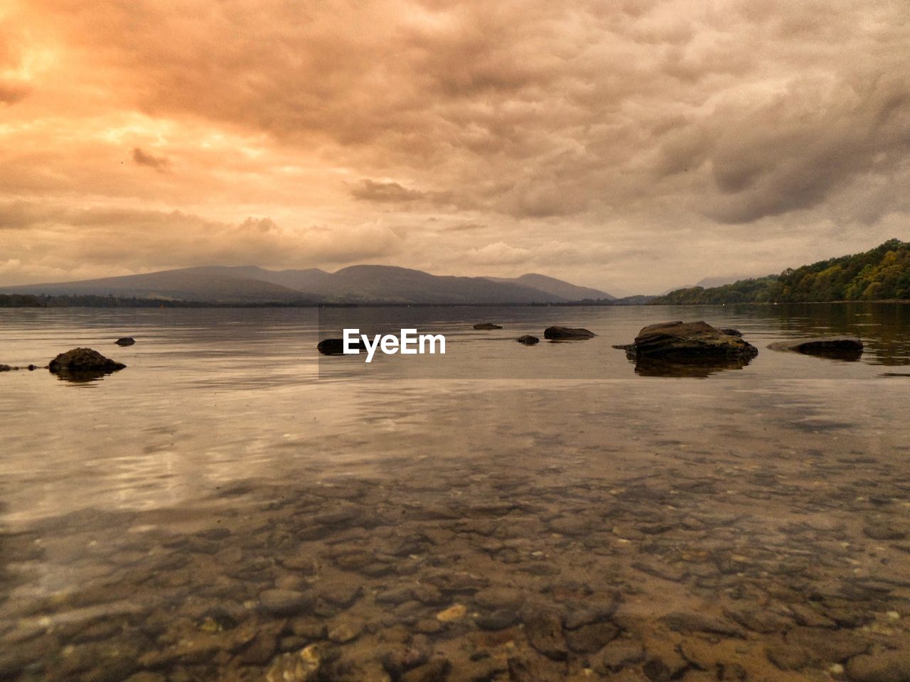 VIEW OF SEA AGAINST CLOUDY SKY