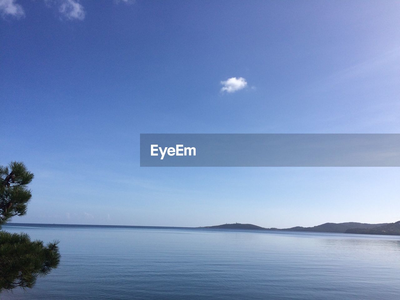 VIEW OF SEA AGAINST BLUE SKY