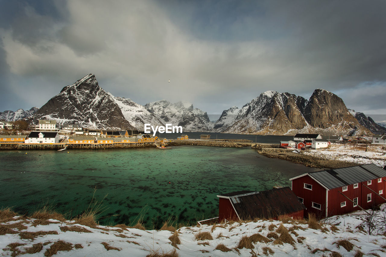 Scenic view of snowcapped mountains against sky during winter