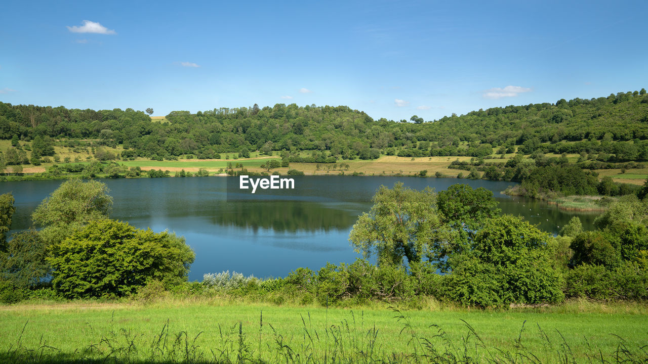 Panoramic image of the landscape of vulkaneifel with maare lakes close to schalkenmehren, germany