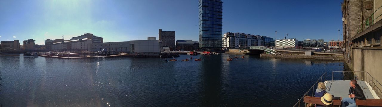 BOATS MOORED IN RIVER