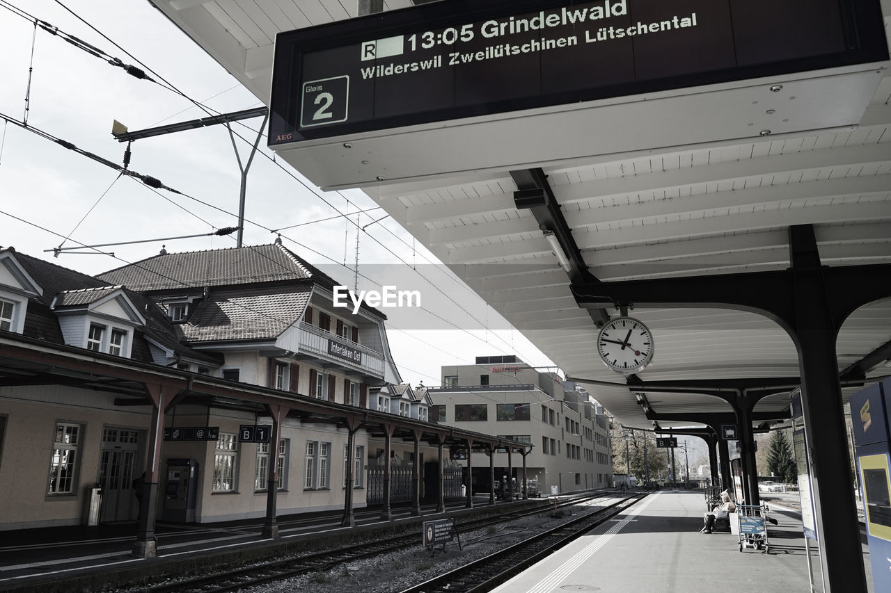 RAILROAD STATION PLATFORM AGAINST SKY