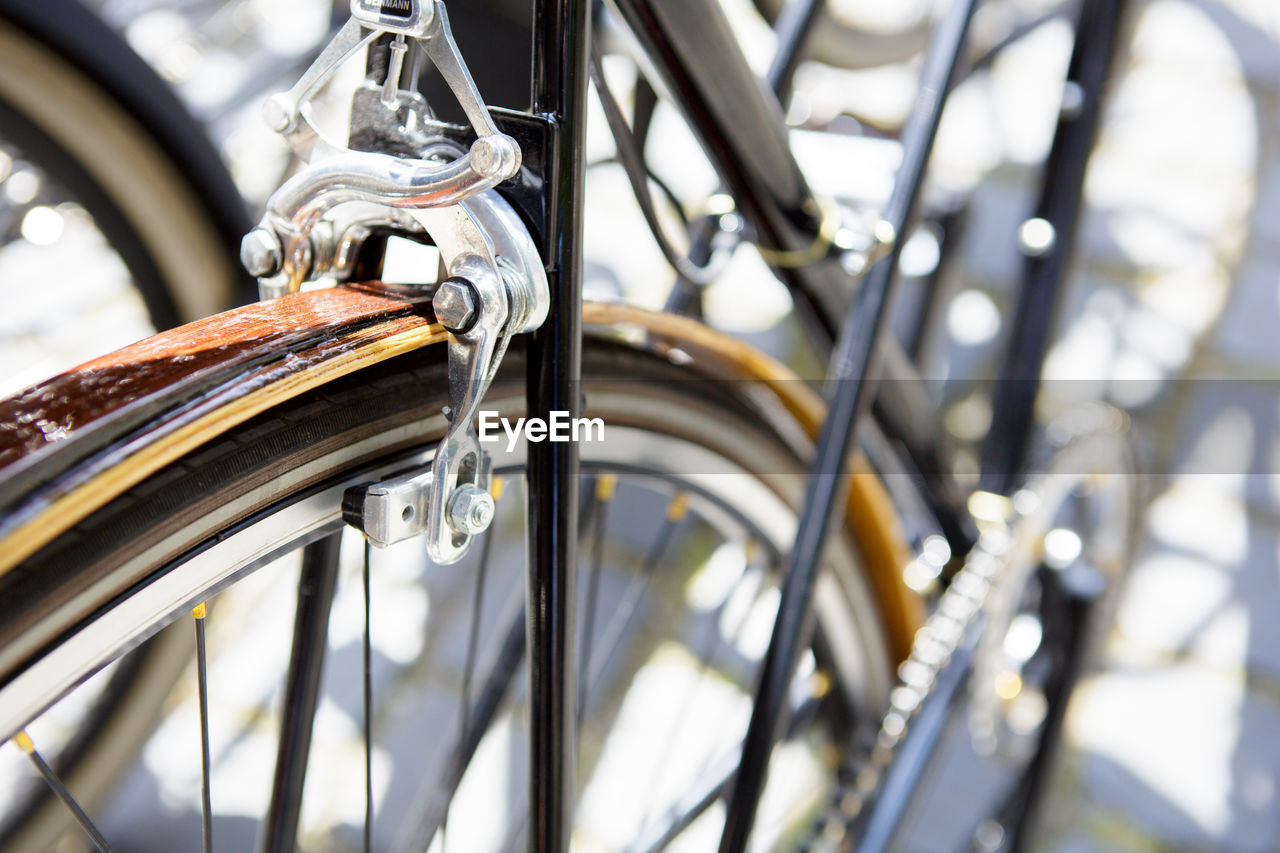 Close-up of bicycle parked outdoors