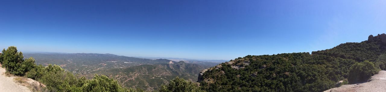 PANORAMIC VIEW OF LANDSCAPE AGAINST CLEAR BLUE SKY