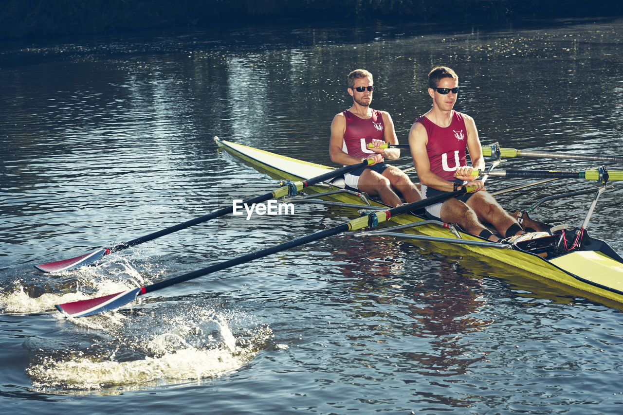 Young men canoeing