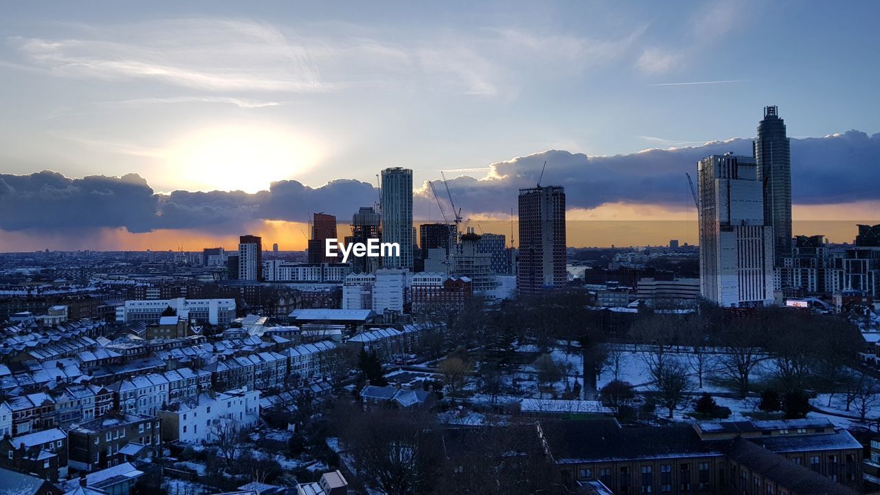 VIEW OF CITY AT SUNSET