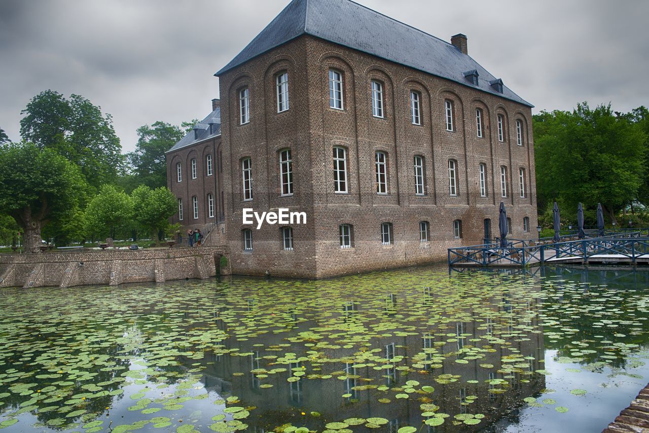 REFLECTION OF BUILDING ON WATER